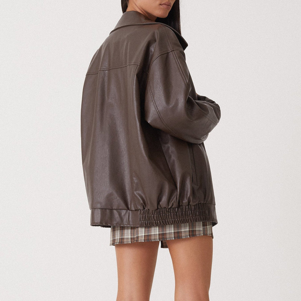 Women's Brown Leather Bomber in brown – The Coraline detail view 1